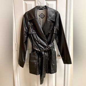 Women’s trench coat by Jou Jou. Size large juniors.